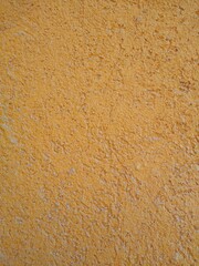 Background from an orange wall of sandstone close-up.