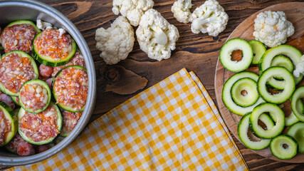 Fresh green zucchini cut into circles prepared for stuffing