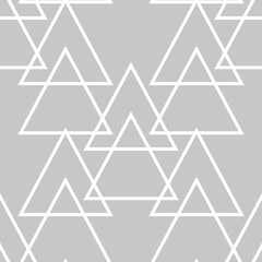 Fototapeta premium Geometric seamless background. Gray and white backdrop with triangle pattern
