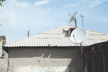 Satellite dish antenna mounted on the private house.