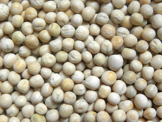Beige and white color raw whole dried peas