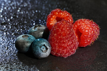 fresh raspberries and blueberries