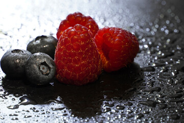 berries on black background
