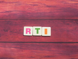 Abbreviation RTI (Respiratory Tract Infection) on wood background