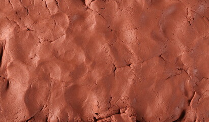 Red modelling clay, playdough surface, texture and background