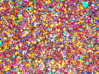 Fototapeta na wymiar Colorful kids backdrop with small candy mosaic