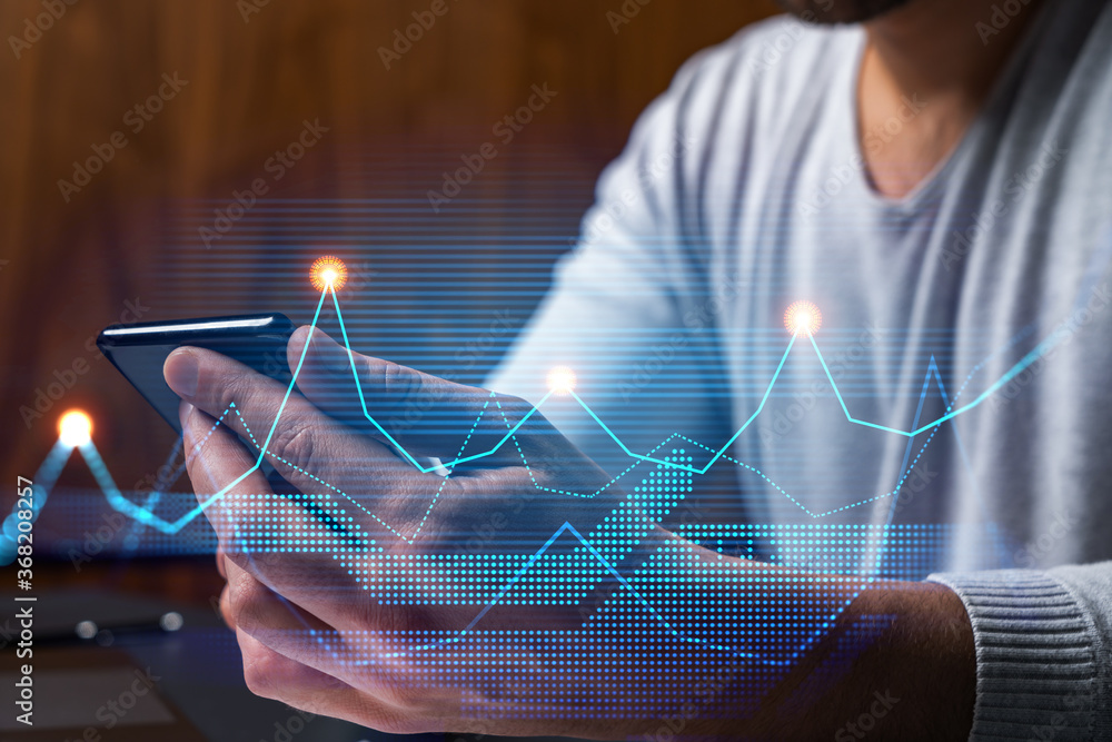 Poster man using phone. hands typing smartphone. double exposure with chart hologram. close up. financial g