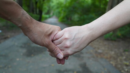 Holding hands and walking together,love won't separate us.