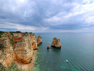 View of the Atlantic ocean in Lagos with blue clouds, Portugal , Algarve