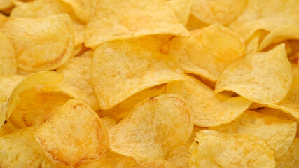craft potato chips with cheddar cheese, close up