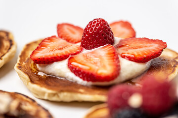 
Tasty breakfast. Pancake with strawberries. Close-up.