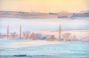 WINTER VIEWS OF FARMLANDS AND FOOTHILLS OF SOUTHERN DRAKENSBERG
 Kwazulu Natal, South Africa. 