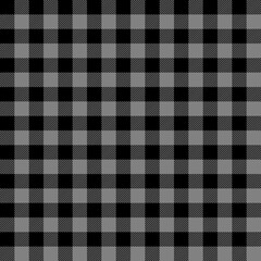 Tartan plaid. Scottish pattern in black and gray cage. Scottish cage. Traditional Scottish checkered background. Seamless fabric texture. Vector illustration