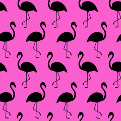 Obraz premium Seamless pattern with black silhouette of flamingo on pink background 