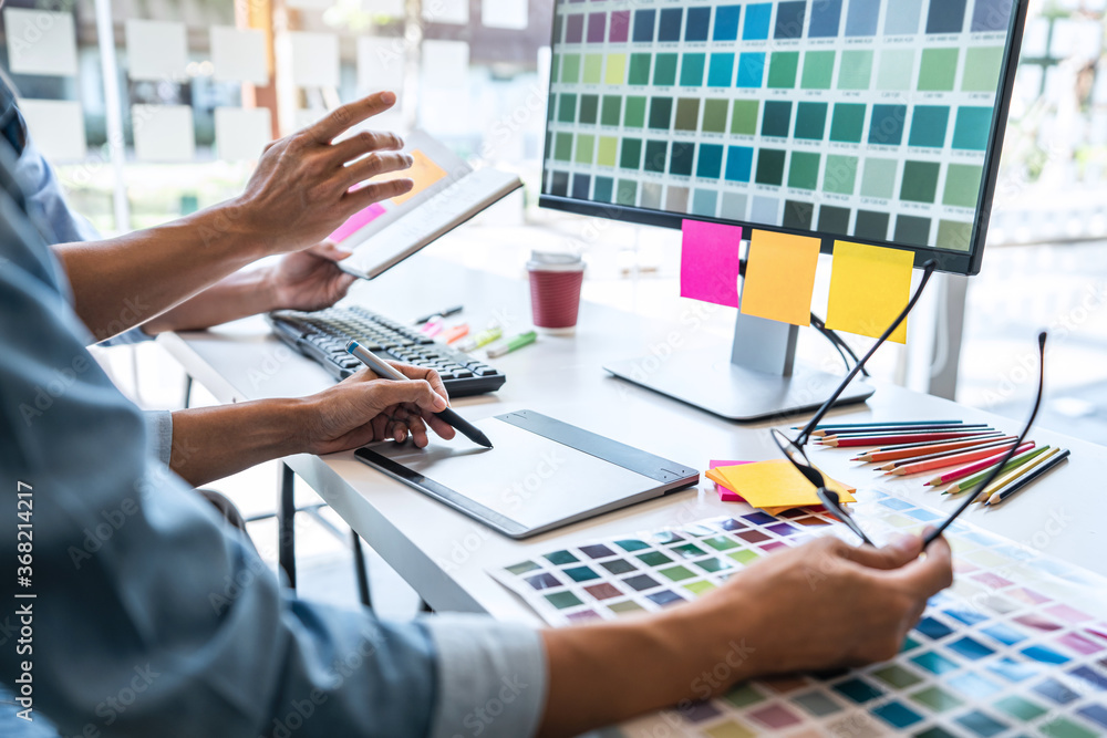 Poster two creative graphic designer working on color selection and color swatches