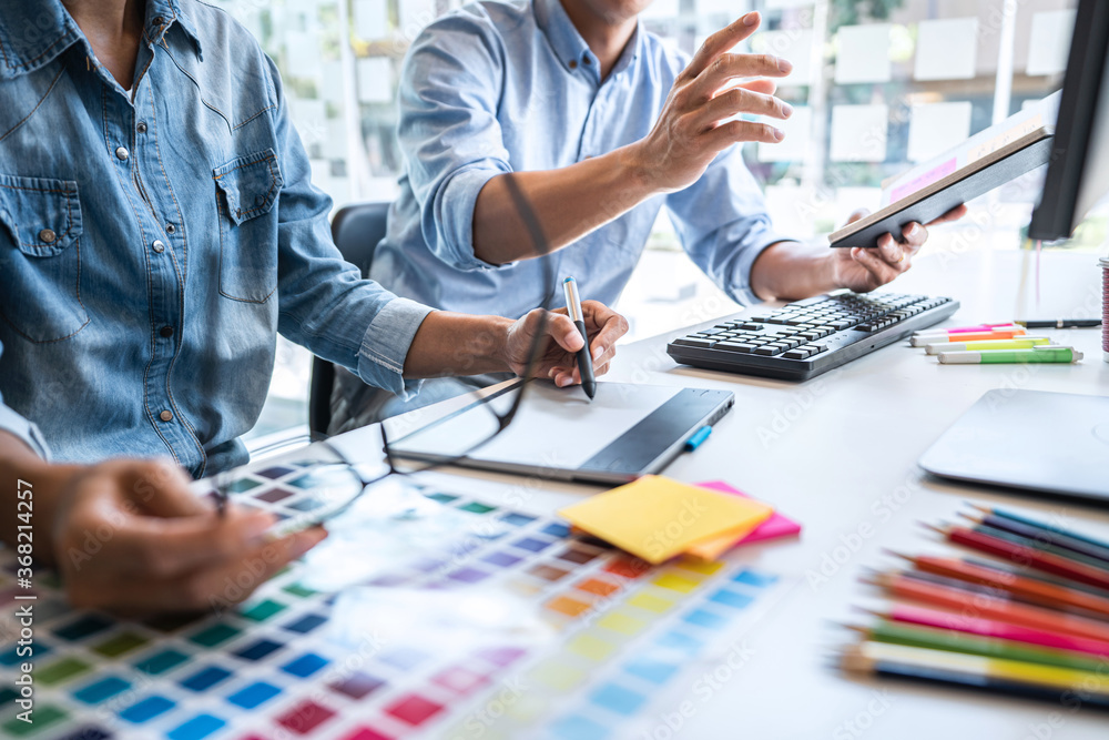 Poster two creative graphic designer working on color selection and color swatches