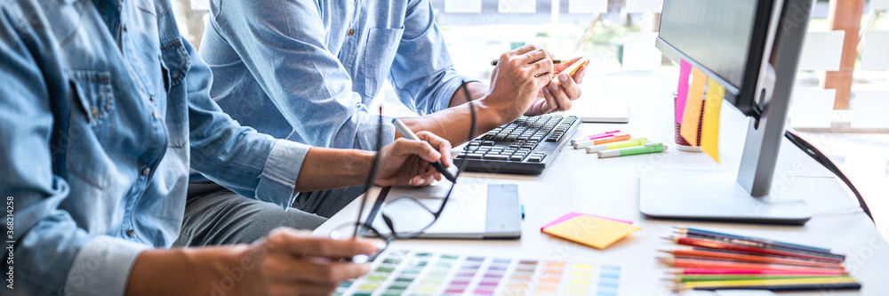 Poster two creative graphic designer working on color selection and color swatches