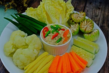 Preserved soy bean dip (Tao Jiaw Lone) Herbed soya beans with minced shrimp and pork in coconut milk served with fresh seasonal vegetables. Authentic Thai food.