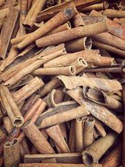 heap of cinnamon sticks as a background