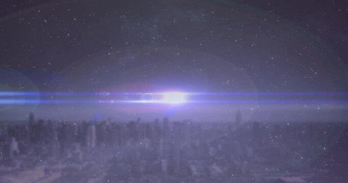 Animation of glowing spot disappearing over city horizon line with night sky with stars 