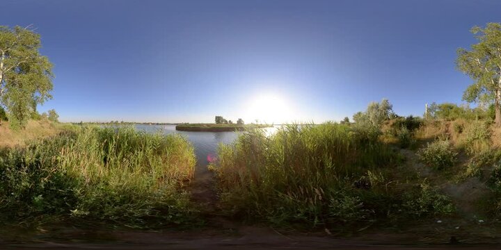 360 VR Nature on the river bank at sunset. The virtual reality