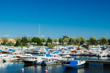 Fototapeta na wymiar Kotka, Finland - 22 June 2020: A view on the parking of boats and yachts in the gulf Sapokka.