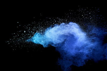 Closeup of blue dust particle splash isolated on black background.