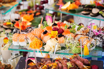 Assortment festive appetizers on the plate, selective focus. Festive buffet. As a photo, for the menu of restaurants, cafes and promotional items.