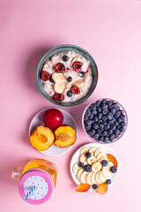 porridge, fruit and berries as healthy yummy breakfast concept