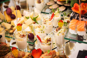 Assortment festive appetizers on the plate, selective focus. Festive buffet. As a photo, for the menu of restaurants, cafes and promotional items.