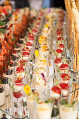 Assortment festive appetizers on the plate, selective focus. Festive buffet. As a photo, for the menu of restaurants, cafes and promotional items.