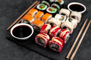 Set of sushi on a stone background. Dinner for two