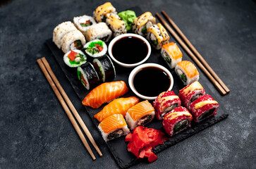 Set of sushi on a stone background. Dinner for two