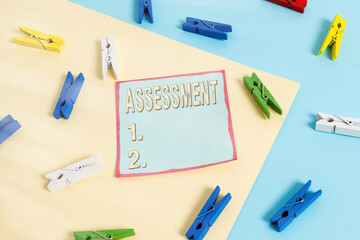Word writing text Assessment. Business photo showcasing action or an instance of making a judgment...