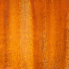 Creative background of rusty metal, painted gray paint carelessly with the remnants of torn paper....