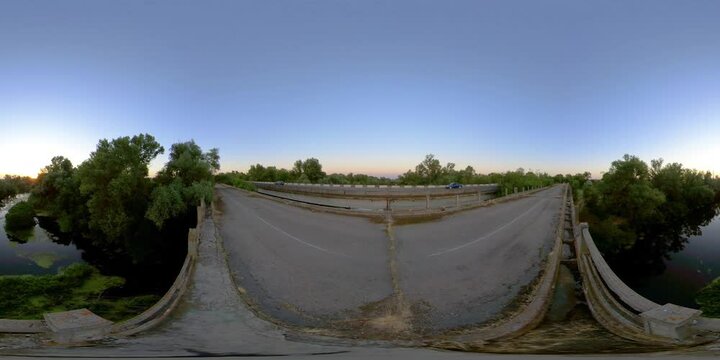 360 VR Old road bridge over the river at sunset. The virtual reality