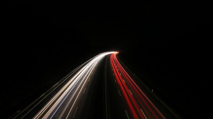 Fototapeta na wymiar blurred lines of light on the highway
