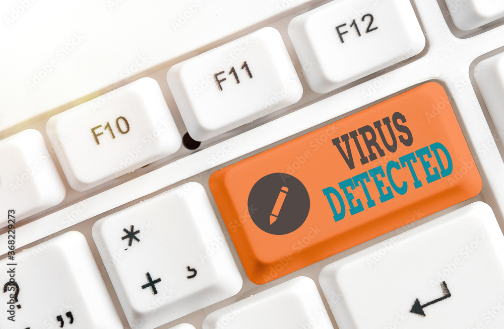 Aufkleber Writing note showing Virus Detected. Business concept for a computer program used to prevent and remove malware Colored keyboard key with accessories arranged on empty copy space