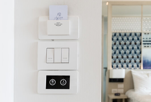 Electronic Keycard holder insert in hotel room. Concept for resort and automation room