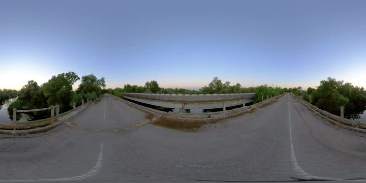 360 VR Old road bridge over the river at sunset. The virtual reality