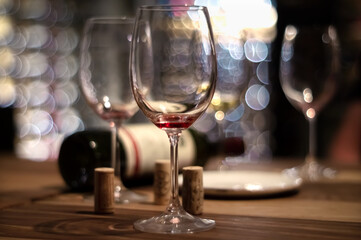 empty wine glasses in a winebar with bokeh beckground