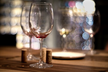 empty wine glasses in a cafe with bokeh around
