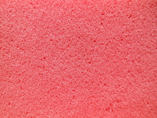 Pink sponge close-up background