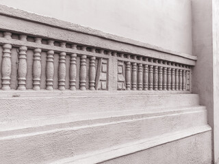 Background an old cement wall with bas-relief of the classic columns. As a creative background for design