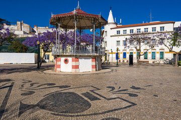 jacaranda tree and bandstand in iron gazebo designs in Faro, Algarve, Portugal
