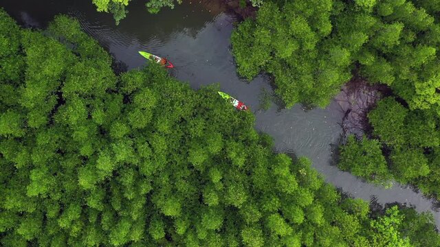 Ao Tha Lane famous place for kayak traveller floats in kayak, tourist is exploring landscape by canoe. Water tourism, Adventure activity, Active holiday weekend.