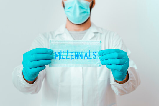 Writing note showing Millennials. Business concept for an individual reaching young adulthood in the early 21st century Laboratory Technician Featuring Sticker Paper Smartphone