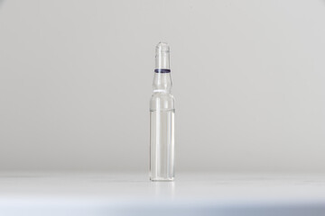 Glass beauty ampoule with concentrated essence inside