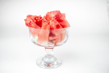 watermelon chopped pieces in a glass cup, summer fruit refreshment