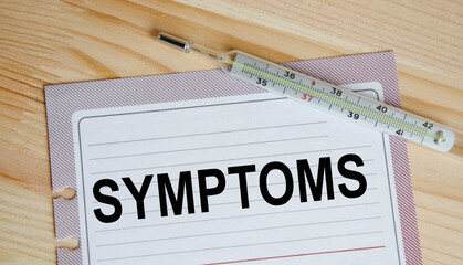 On a sheet of diary inscription Symptoms, next to the thermometer.